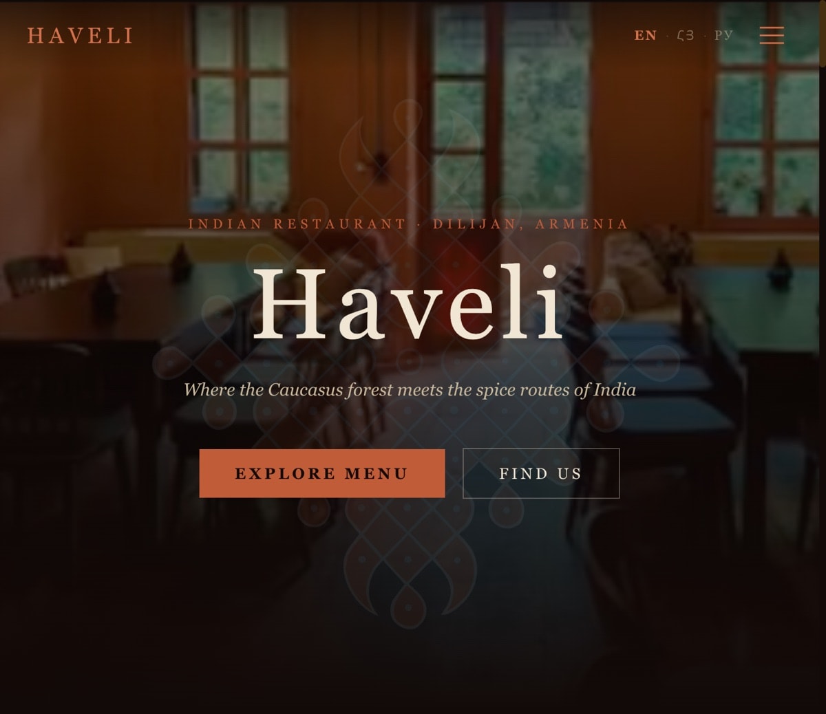 Haveli's restaurant homepage with its warm, dark dining-room design